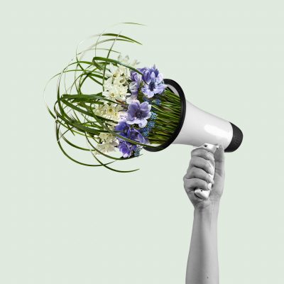 Megaphone with bouquet with blooming spring flowers on pastel background. Copy space for ad, text. Modern design. Conceptual, contemporary bright artcollage. Summertime, surrealism, fashionable.
